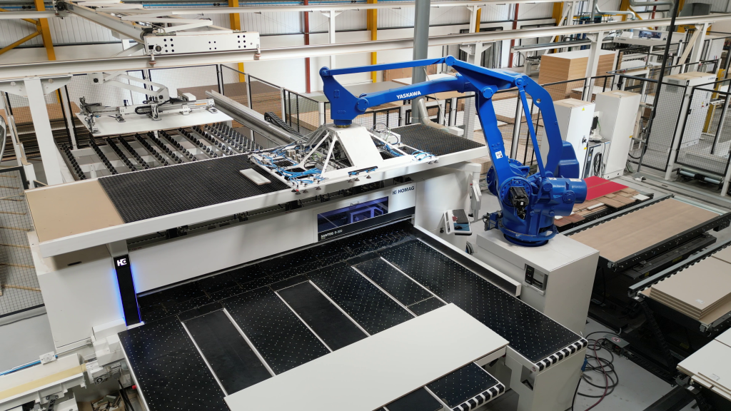Automated robot unloads CNC